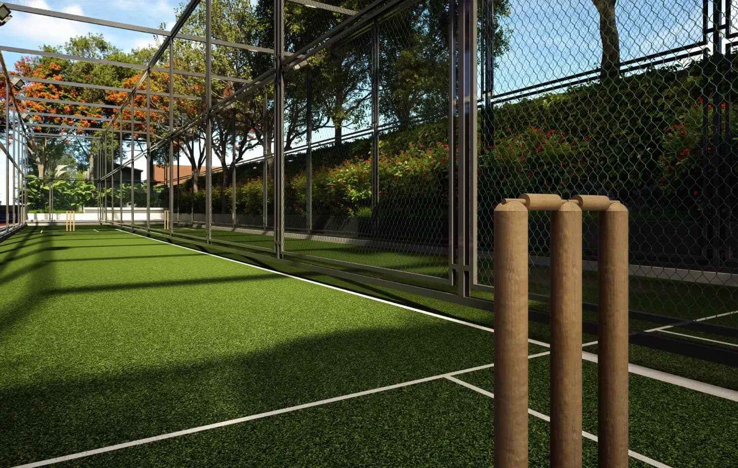 Cricket practice nets with stumps in the foreground